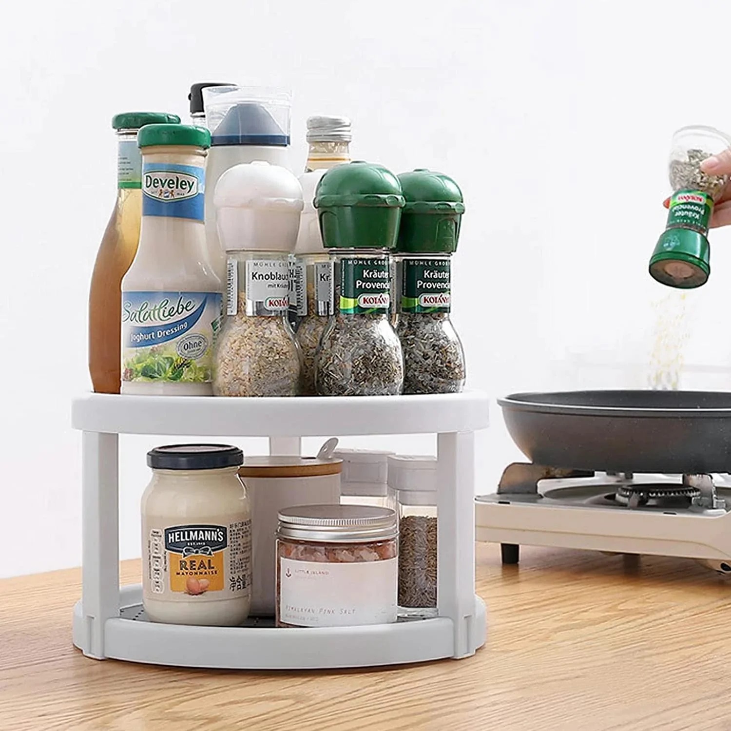 2-tier lazy susan turntable organizer stocked with spices and jars